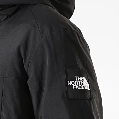 The North Face - Cortavientos Windall 3XXK con capucha y cuello con cremallera negro