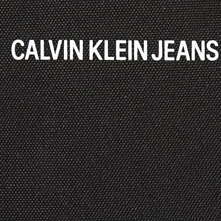 Calvin Klein - Sacoche Sport Essentials Micro Flat Noir
