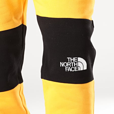 The North Face - Pantalon Jogging Himalayan 3OD5 Jaune Noir