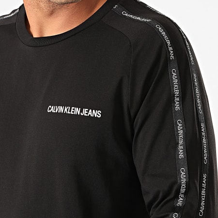Calvin Klein - Tee Shirt Manches Longues A Bandes Institutional Tape 4188 Noir