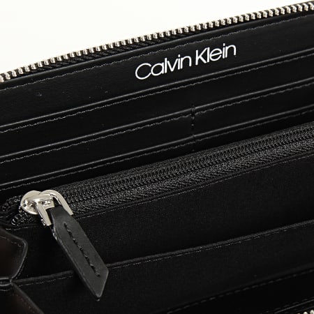 Calvin Klein - Portefeuille CK Monogram Ziparound 6560 Noir