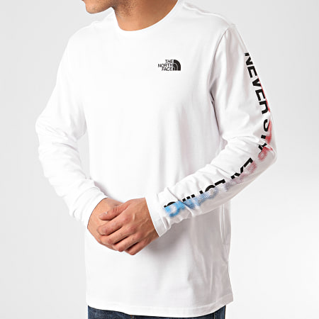 The North Face - Tee Shirt Manches Longues Graphic Flow A4927 Blanc