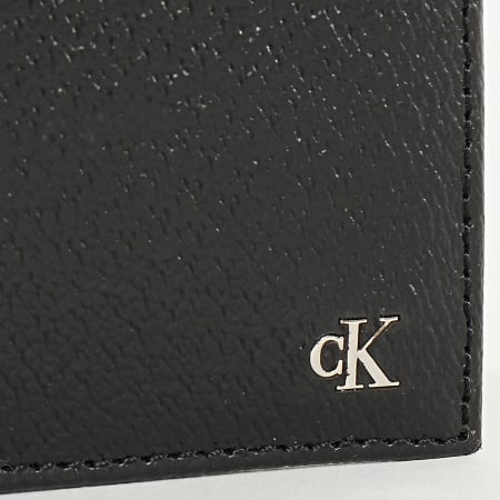 Calvin Klein - Portefeuille Monogram Texture Bifold 5593 Noir