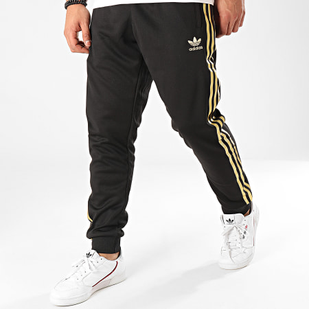Adidas Originals - Pantalon Jogging A Bandes SST 24 GK0656 Noir Doré