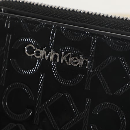 Calvin Klein - Portefeuille Femme Must EM Zip Flap 6799 Noir
