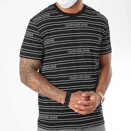 Calvin Klein - Tee Shirt A Rayures Stripe Logo AOP 6333 Noir