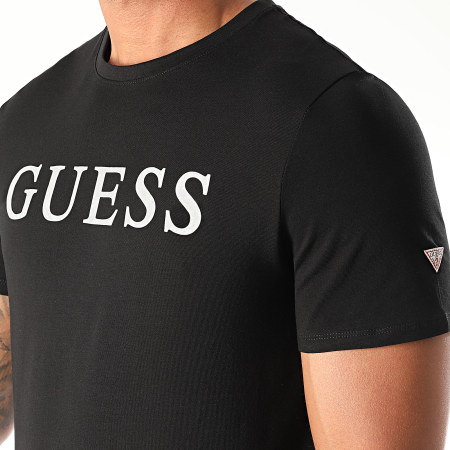 Guess - Tee Shirt M0YI08-J1300 Noir Argenté