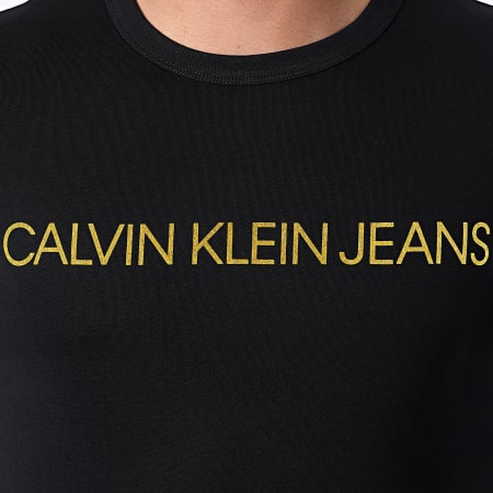 Calvin Klein - Tee istituzionale oro a maniche lunghe 7721 Oro nero