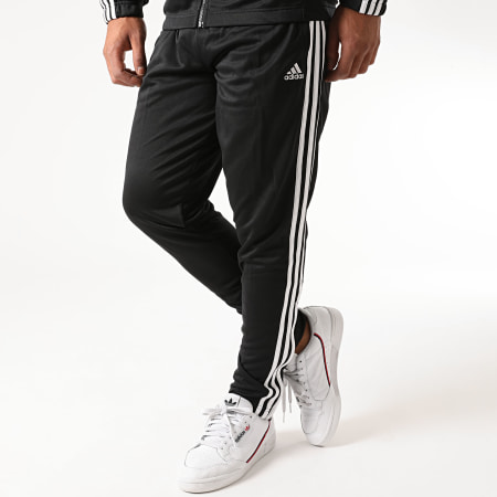 Le pantalon survêtement accent filet Tiro noir, Adidas