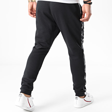 Pantalon survetement shop reebok