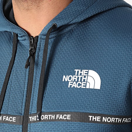 The North Face - Sweat Zippé Capuche Mountain Athletics 5574 Bleu Marine Réfléchissant