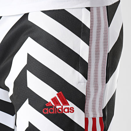 Adidas Sportswear - Pantalon Jogging A Bandes Manchester United FC AOP GK9435 Blanc Noir
