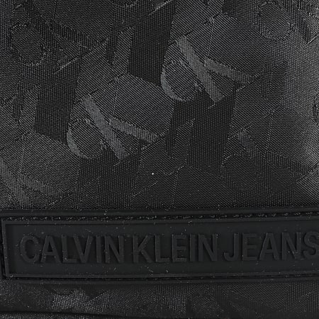 Calvin Klein - Sacoche Micro Reporter 6472 Noir