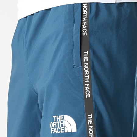 The North Face - Pantalon Jogging A Bandes Woven A5599KX7 Bleu Marine