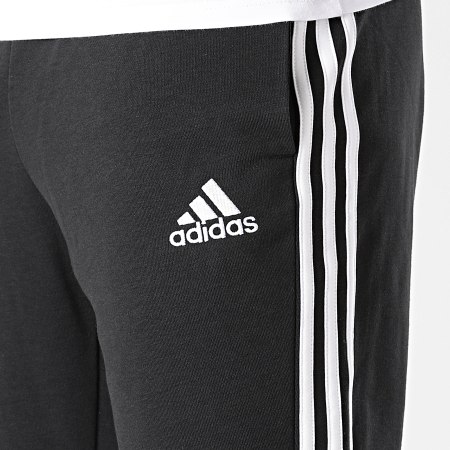 Adidas Sportswear - Pantaloni da jogging Essentials in French Terry con banda affusolata GK8829 Nero