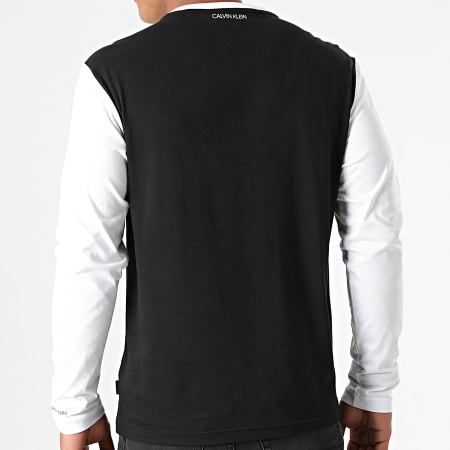 Calvin Klein - Tee Shirt Manches Longues Logo Stripe 7311 Noir Blanc