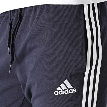 Adidas Sportswear - GK8997 Pantaloni da jogging a bande blu navy