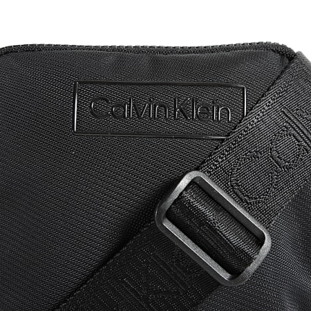 Calvin Klein - Sacoche Code Flatpack 7320 Noir