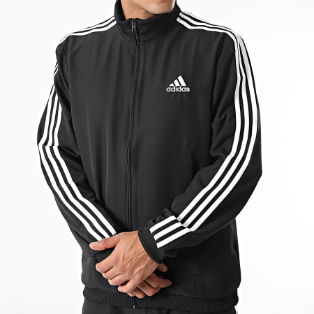 Adidas Sportswear - GK9950 Tuta da ginnastica nera con strisce