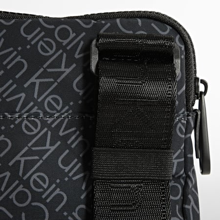 Calvin Klein - Sacoche Code Flatpack 8094 Noir