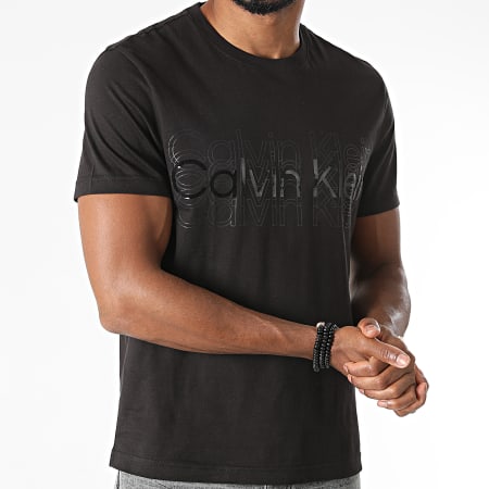 Calvin Klein - Tee Shirt Multi Logo 7606 Noir