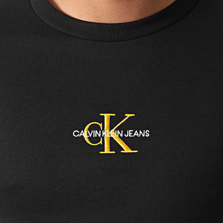 Calvin Klein - Tee Shirt Manches Longues New Iconic Essential 1602 Noir Doré