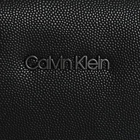 Calvin Klein - Sacoche D2N Flatpack 7957 Noir