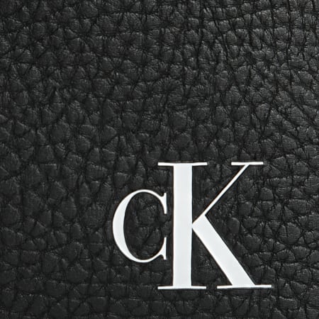 Calvin Klein - Sacoche Tagged Flatpack 8207 Noir