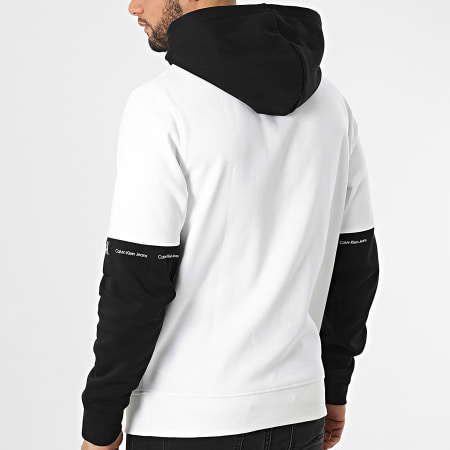 Calvin Klein - Sweat Capuche Repeat Logo Colorblock 9710 Blanc Noir
