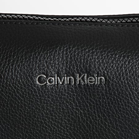 Calvin Klein - Sacoche Must Reporter 8690 Noir