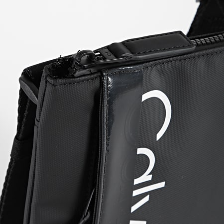 Calvin Klein - Sacoche Summer Proof Flatpack 8727 Noir