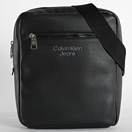 Calvin Klein - Bolso Micro Pebble Reporter 8770 Negro