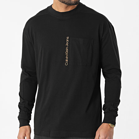 Calvin Klein - Insitucional Bolsillo de Temporada Camiseta Manga Larga 0206 Negro