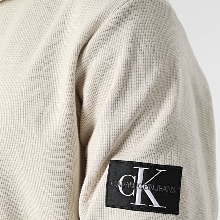 Calvin Klein - Felpa con cappuccio Waffle Zip con stemma Monogram 0605 Beige
