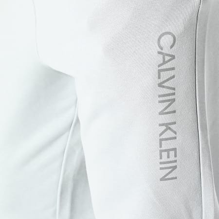Calvin Klein - 1P606 Pantalones de chándal reflectantes gris claro