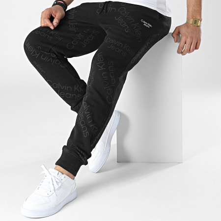 Calvin Klein - Pantaloni da jogging con logo stampato all over 0586 Nero