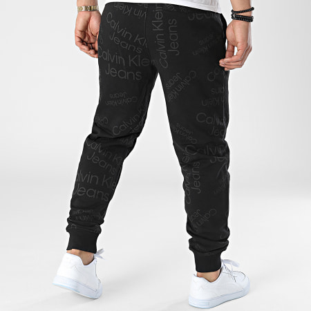 Calvin Klein - Pantaloni da jogging con logo stampato all over 0586 Nero