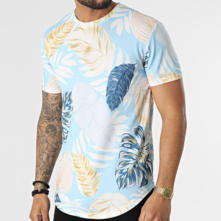 Frilivin - Camiseta oversize azul claro con flores