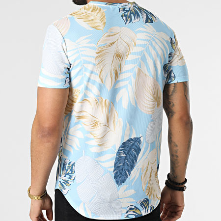 Frilivin - Camiseta oversize azul claro con flores