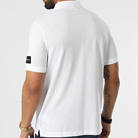 Calvin Klein - Polo a manica corta con tasca sul petto Tech Repreve Pique 8729 Beige chiaro