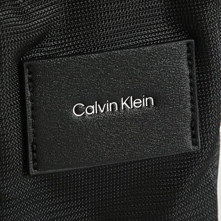 Calvin Klein - Sacoche CK Must Reporter XS 9116 Noir