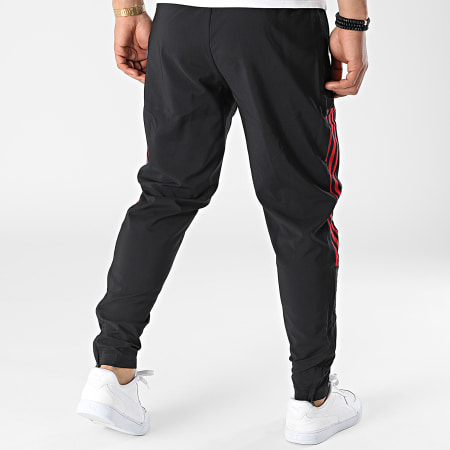 Adidas Sportswear - Manchester United HG6041 Pantaloni da jogging a banda nera