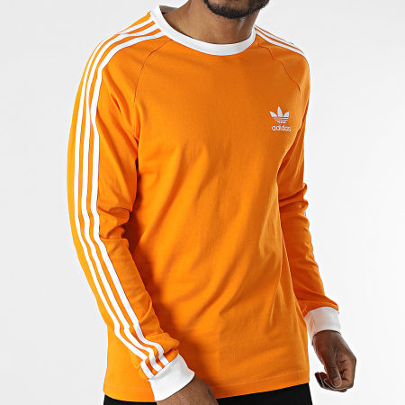 Adidas Originals - Tee Shirt Manches Longues A Bandes 3 Stripes HE9531 Orange