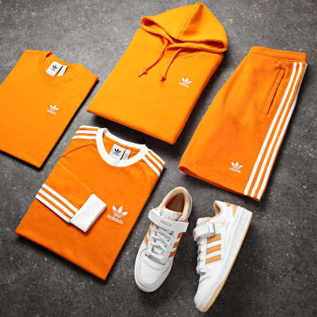 Adidas Originals - Maglietta a maniche lunghe a 3 strisce HE9531 Arancione