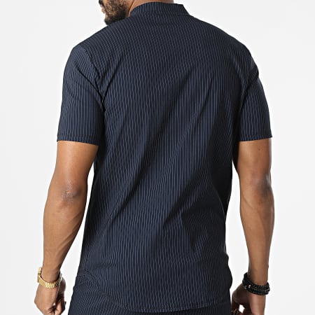 Uniplay - Conjunto de camiseta con cuello con cremallera y pantalón corto a rayas UY847 Azul marino