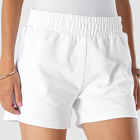 Calvin Klein - Pantalones cortos de chándal de mujer con rayas laterales Logo Tape 8964 Blanco