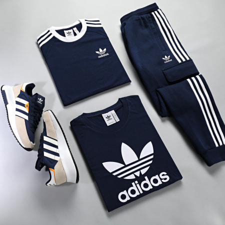 Adidas Originals - HK9687 Pantaloni da jogging a 3 strisce blu navy