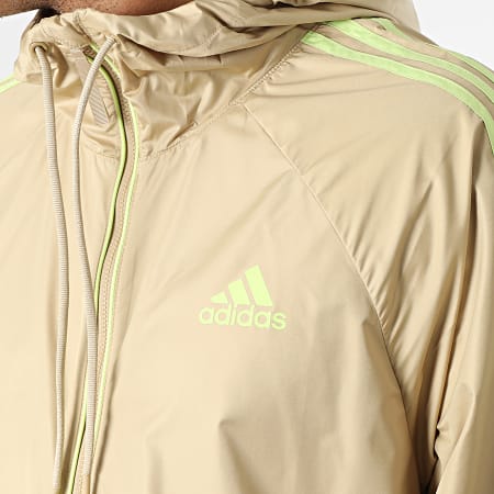Adidas Sportswear - Giacca a vento con cappuccio 3 Stripes H65775 Beige