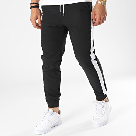 Chandal negro sales con raya blanca