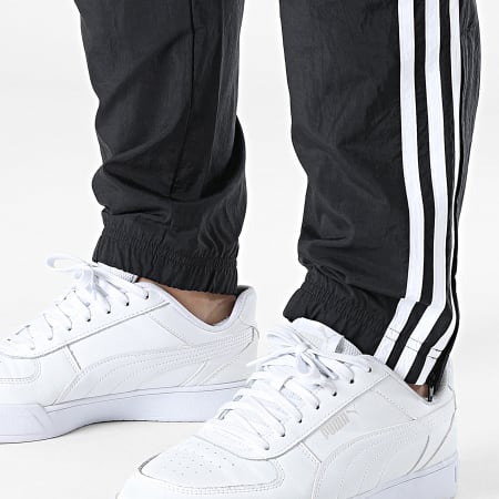 Adidas Originals - HK7325 Pantalón de chándal con banda Negro